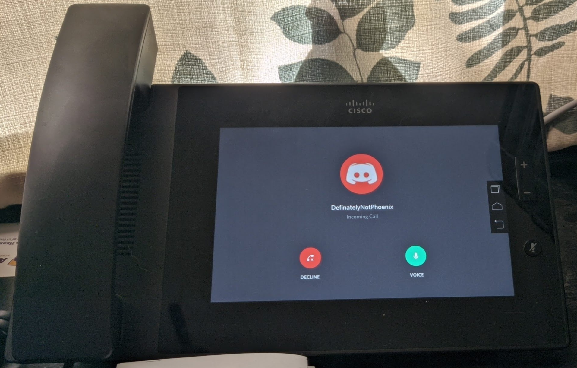 Picture of phone running Discord